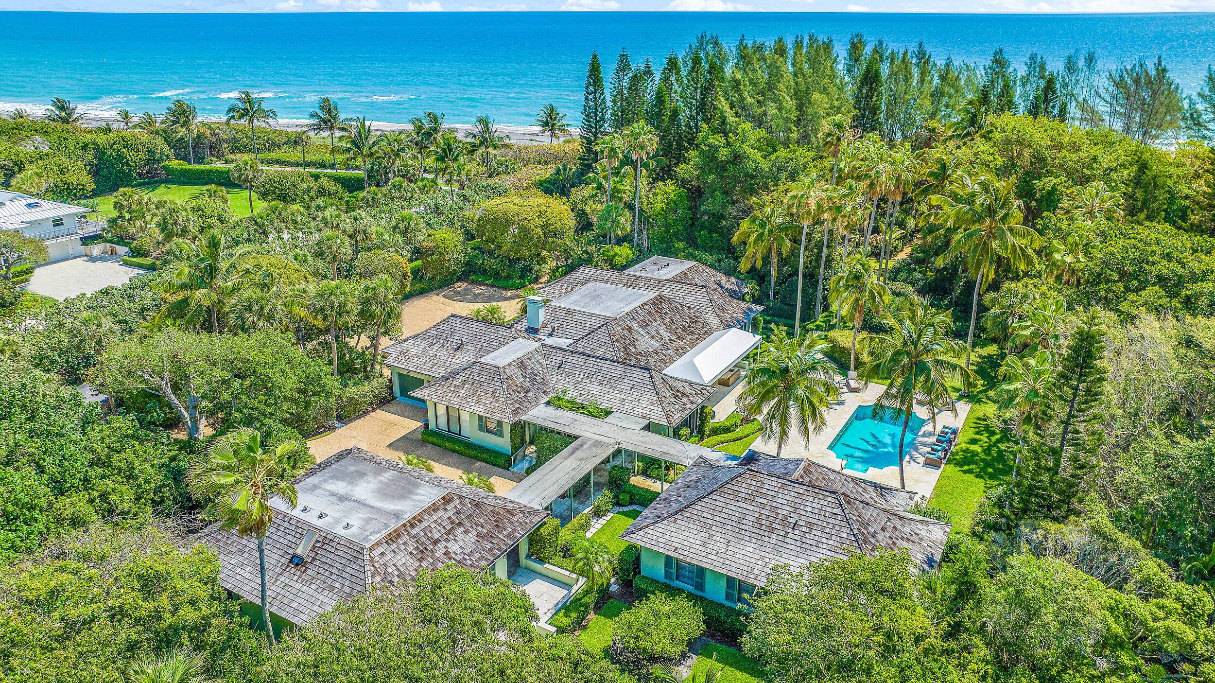 Completely private, furnished oceanfront main house with two guesthouses totaling of 6 bedrooms, each with an ensuite bathroom on 3 acres.