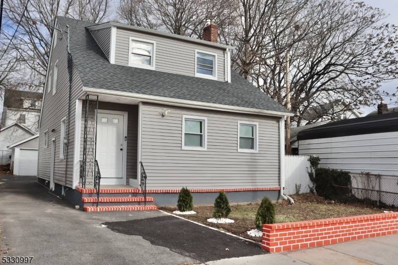 This beautifully renovated 4 bedroom, 2 bathroom Colonial home combines classic charm with contemporary updates.