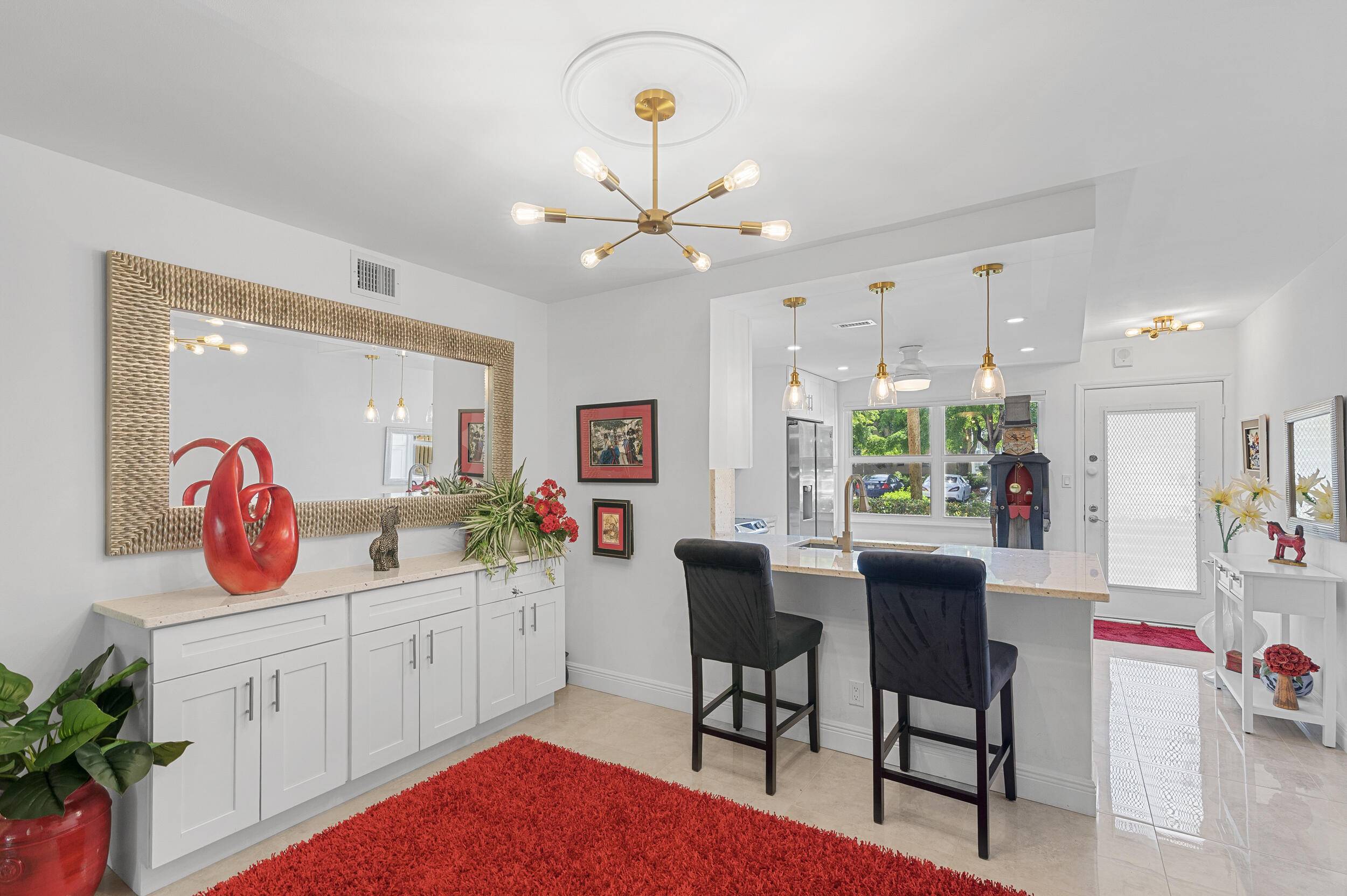 This exquisite 2BD 2BA 1st floor condo has been meticulously renovated with high end finishes.