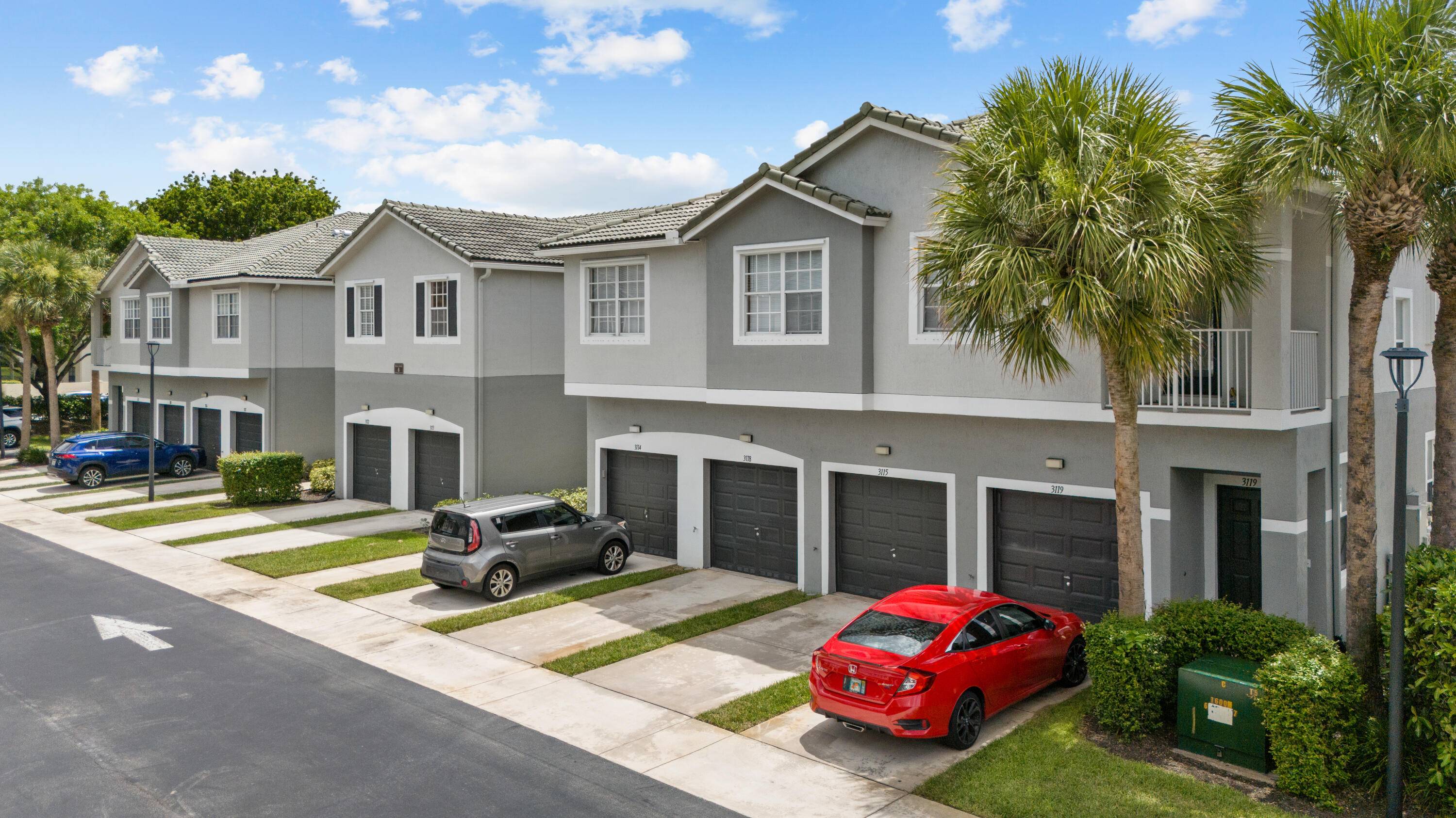 Step into luxury with this stunning modern home featuring stainless steel appliances, gleaming white quartz countertops, and a bright, open layout perfect for living and entertaining.