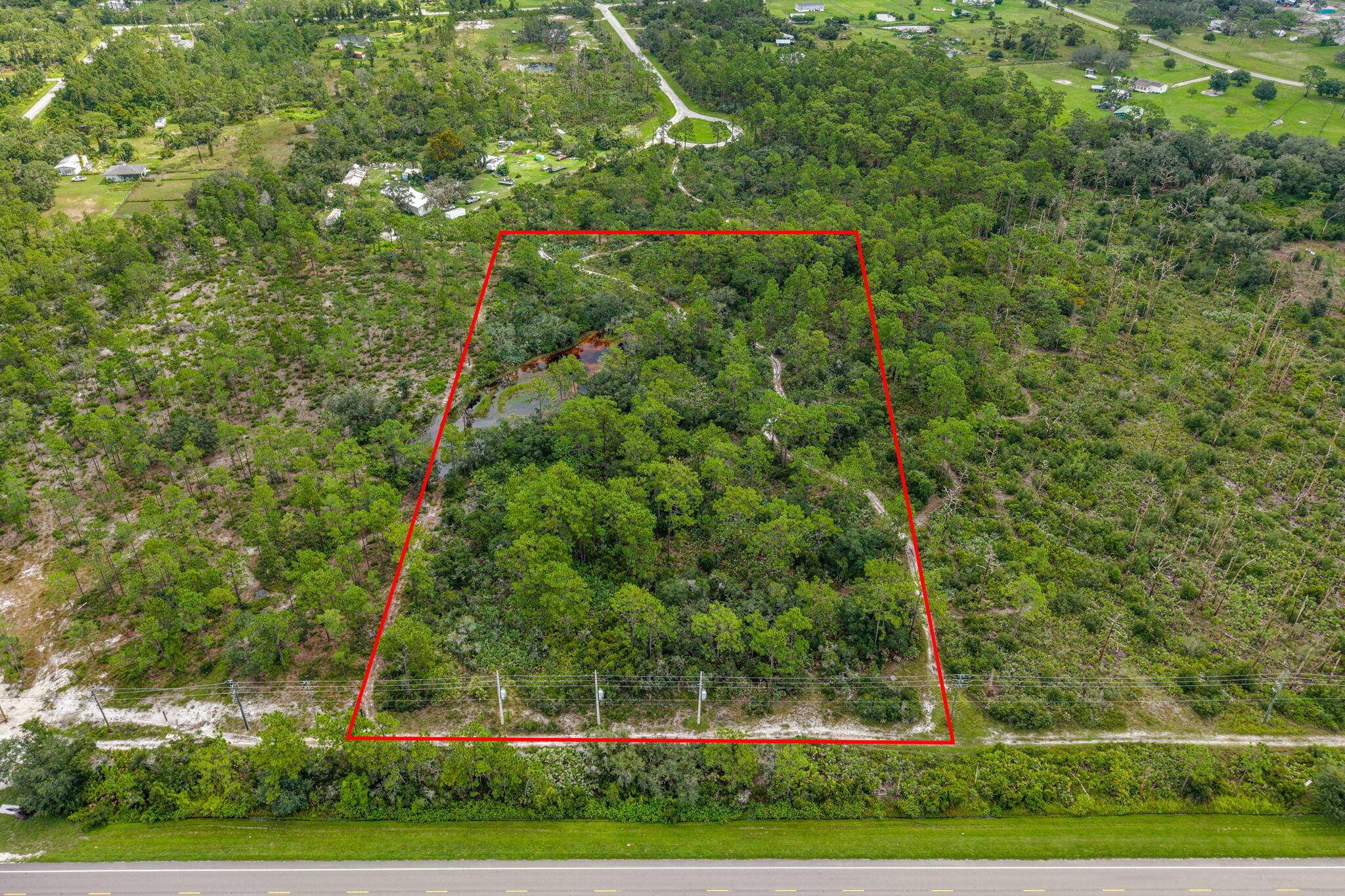 5 acres featuring 330 feet of frontage on US Highway 441 North with a buried fiber optic line.