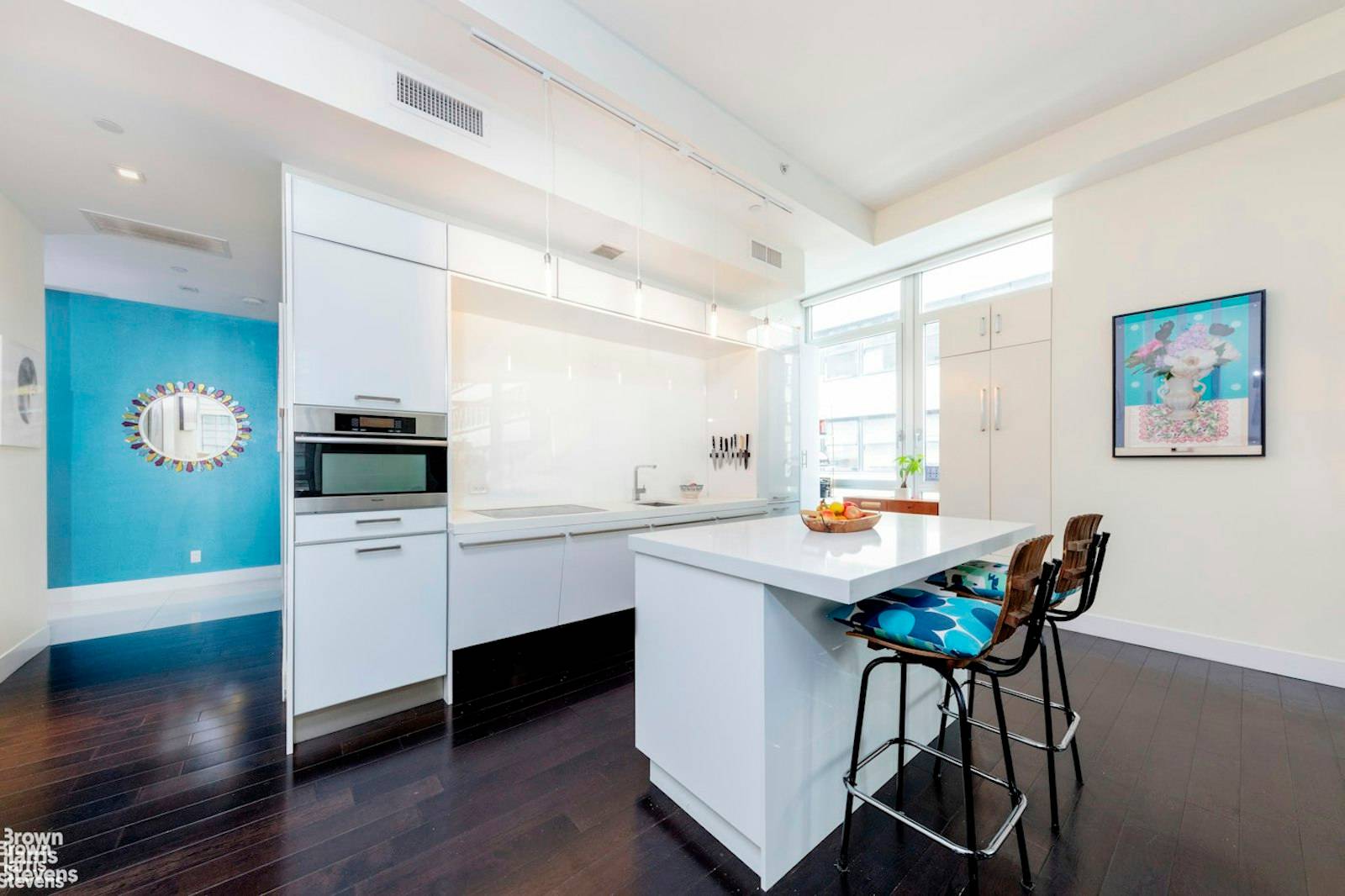 Soaring ceilings and expansive spaces define this modern, loft like corner 2 bed, 2 bath home.