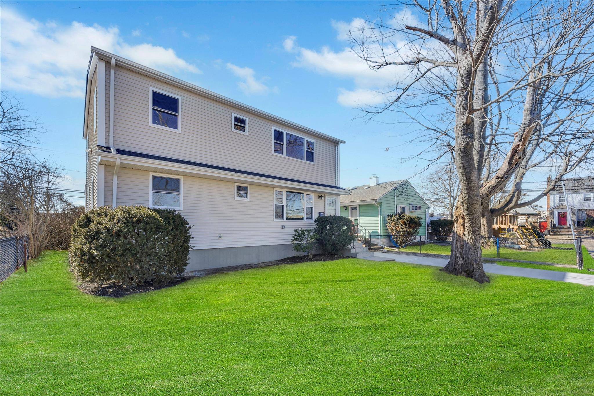 Beautifully Remodeled Expanded Ranch, Features Open Floor plan with Spacious Living Room and Gourmet Kitchen, 5 Bedrooms, 2 Newly Remodeled Full Bathrooms.