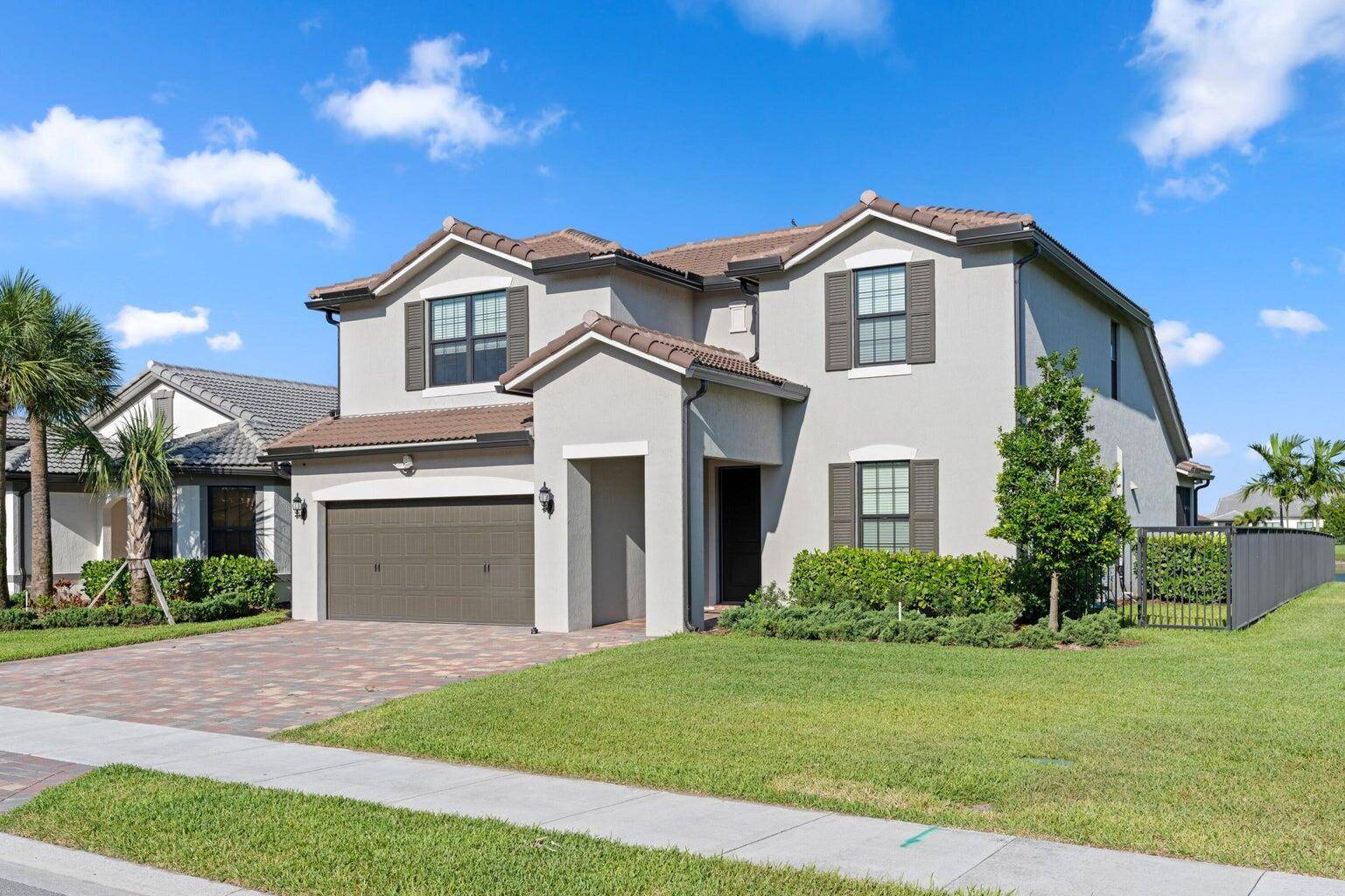 Lake views, luxury vibes, and loaded with space welcome This 5 bed stunner sits on a corner lot with a dreamy water view and a layout built for real life.