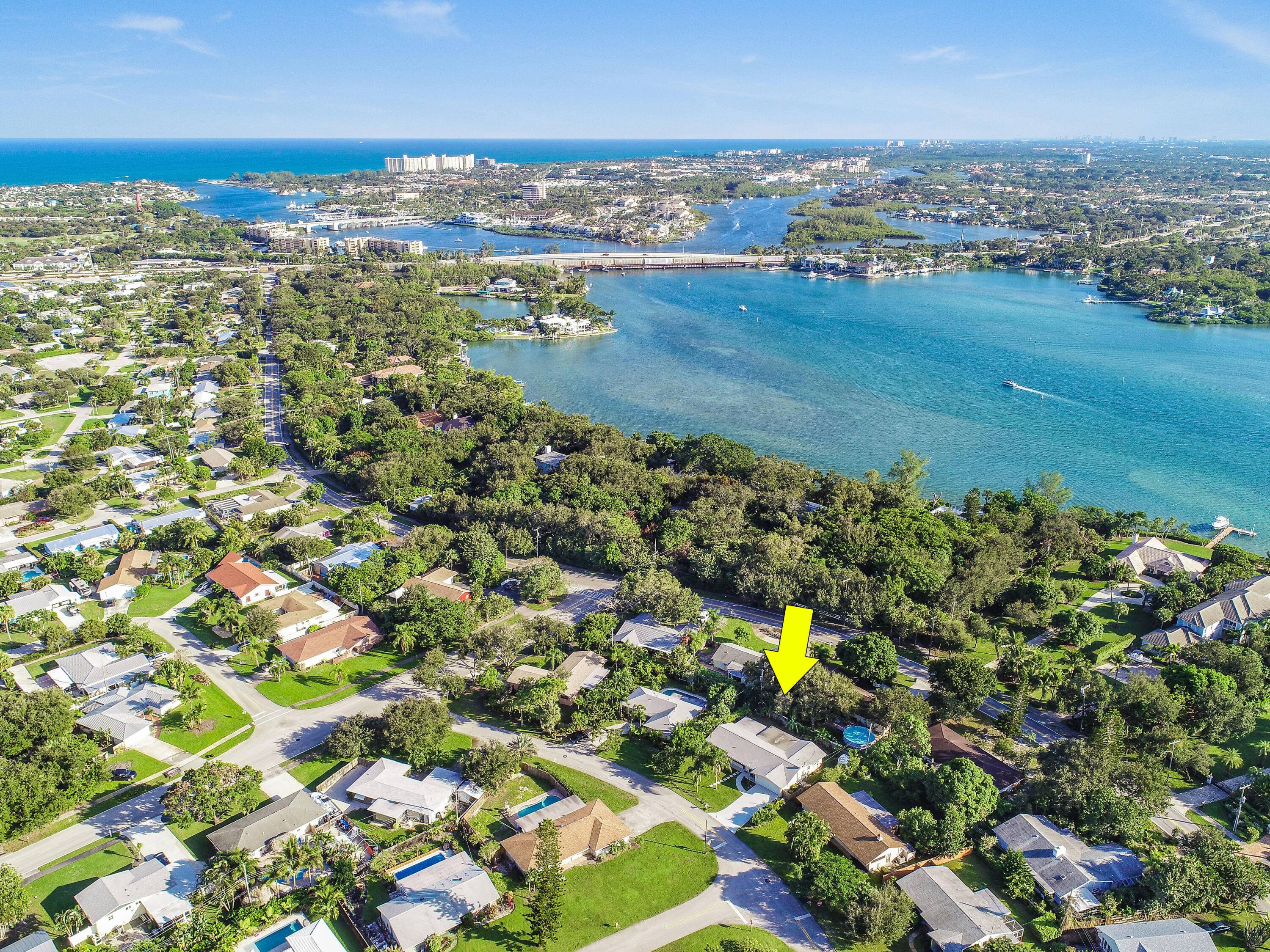 Charming Beachside Retreat Nestled just off Riverside Drive, just moments from the pristine sands of Jupiter Beach, this beautifully renovated single family home offers the ultimate coastal lifestyle.