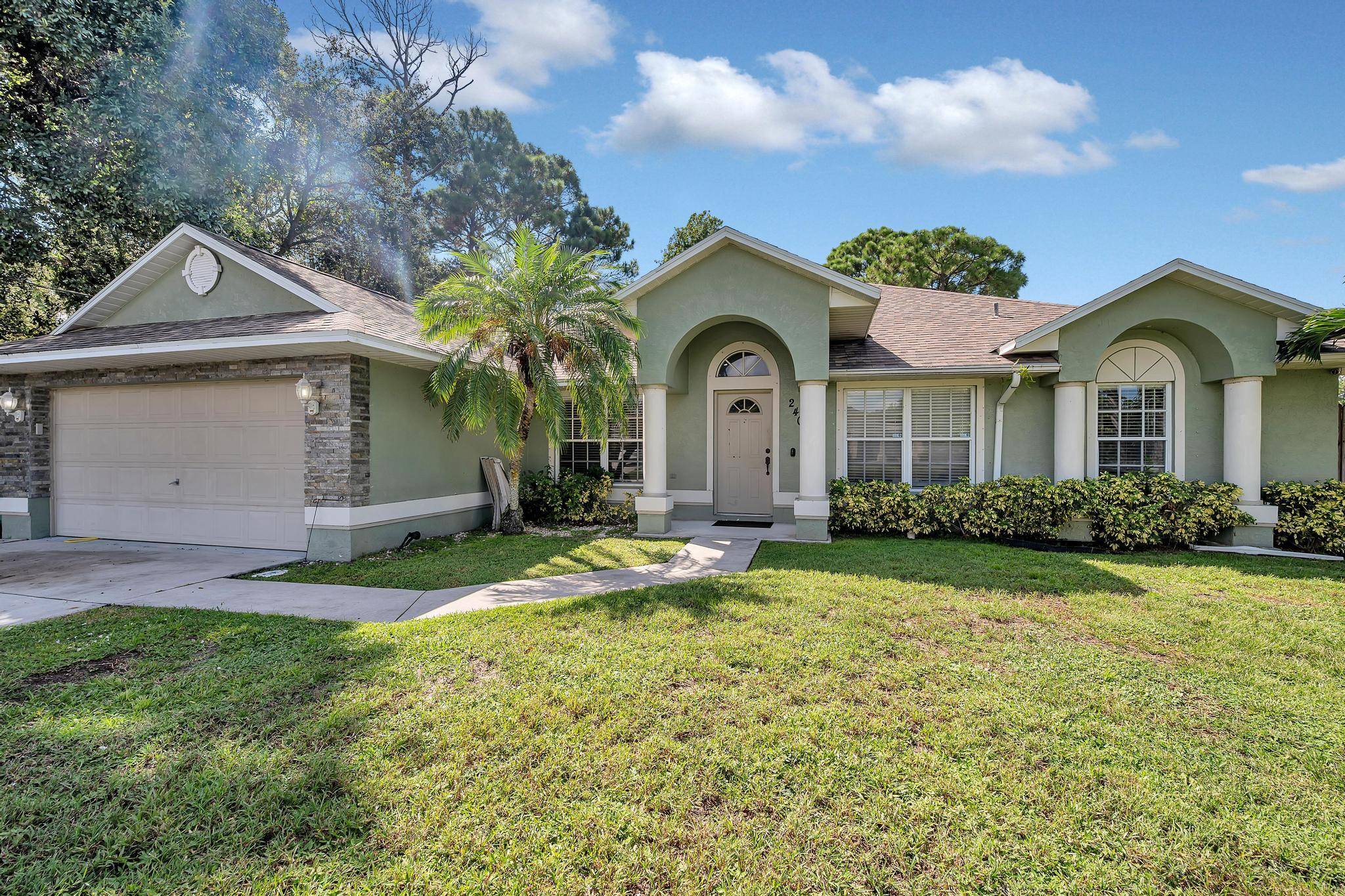 Beautifully updated 3 bed, 2 bath corner lot home featuring a 2018 roof, 2024 water heater, modern AC, new appliances, and stylish new flooring.