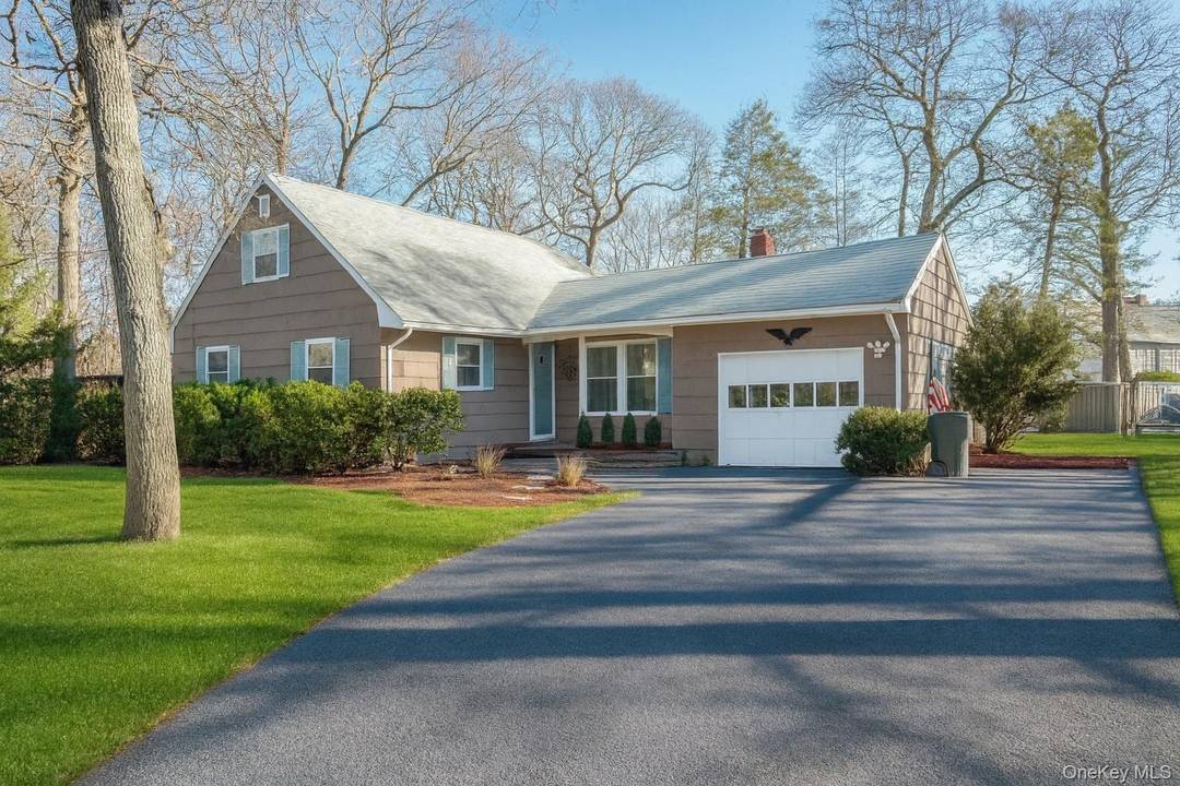 Delightful 4 Bedroom, 2 Bath Cape Style Home Nestled In A Peaceful Mattituck Neighborhood.
