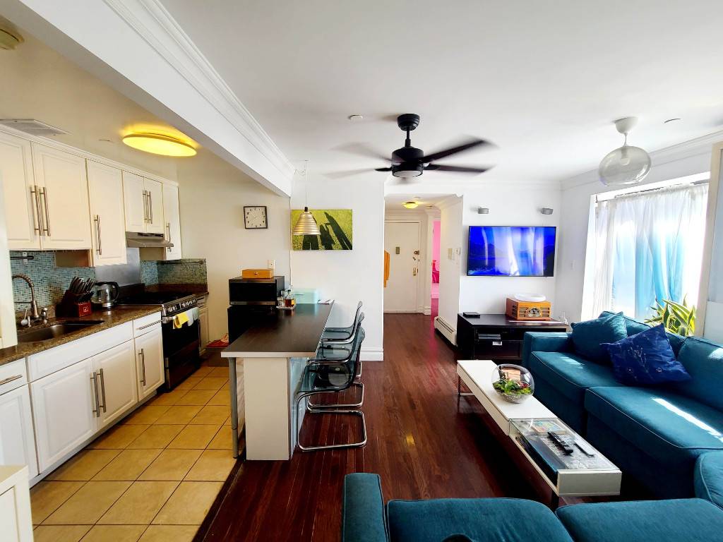 Introducing a luxurious living experience in the heart of Sunnyside at 4907 43rd Ave, Apt 7F !