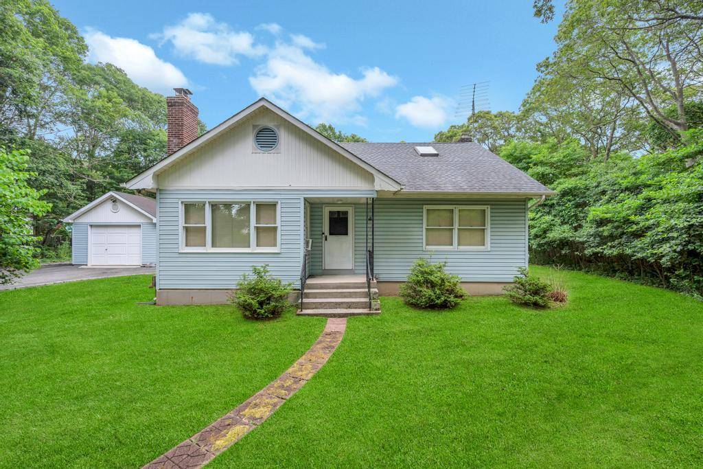 Nestled Exp Cape on 1 acre of property Exp in rear of home.