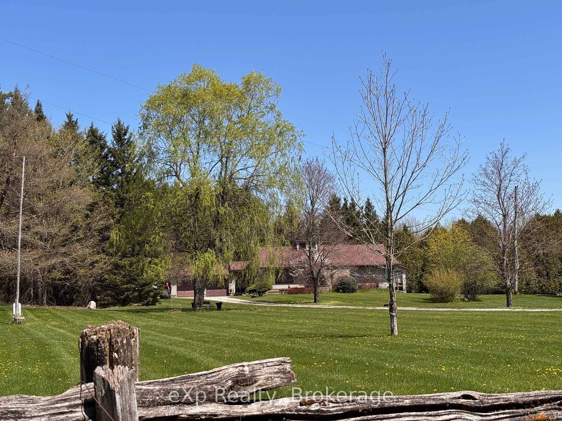 Welcome to this impressive, custom built home, privately nestled on 22 acres and set well back from the road.