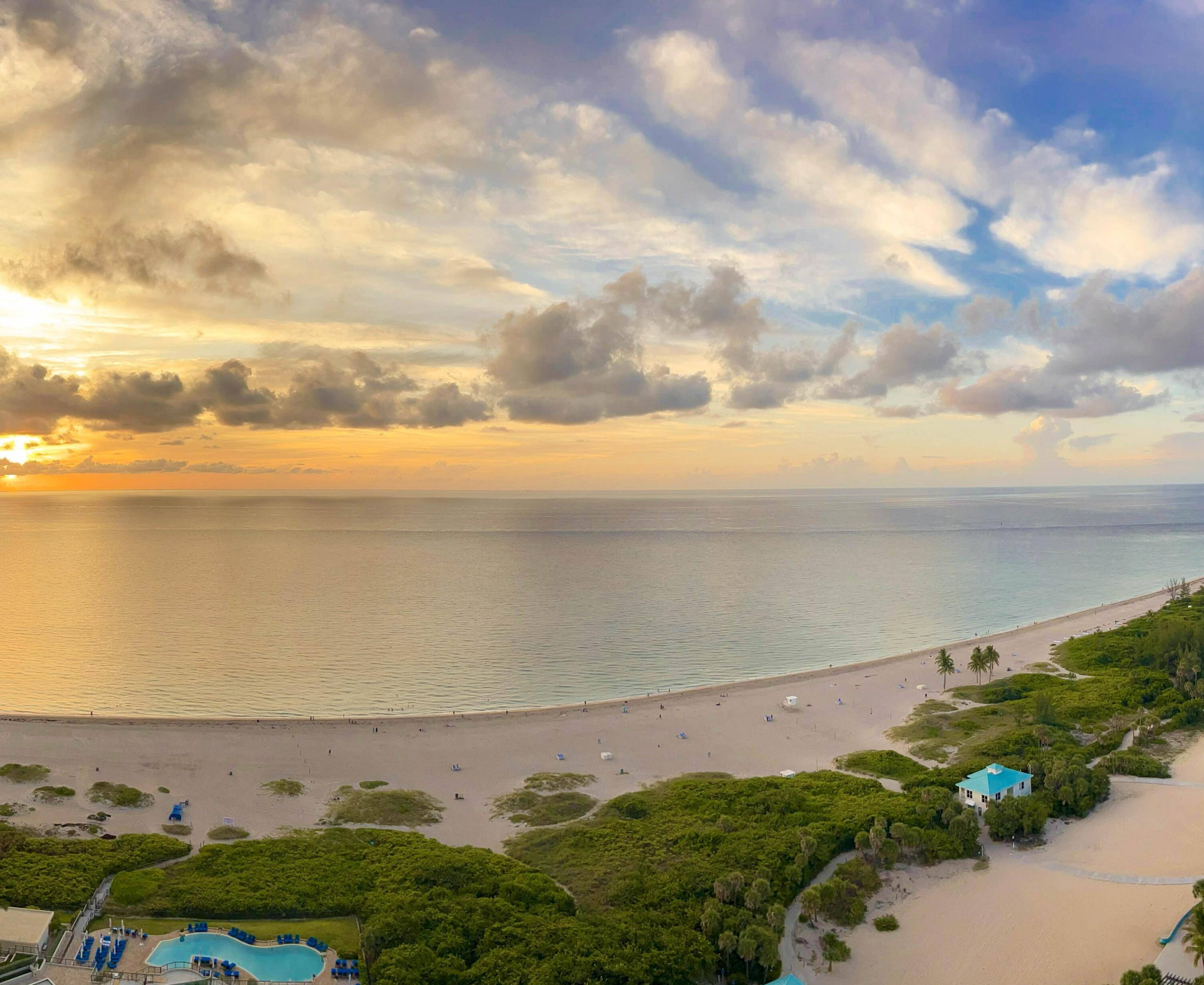 Experience refined coastal living in this elegant two bedroom plus den, two and a half bath residence at The Ritz Carlton Residences, set on 8.