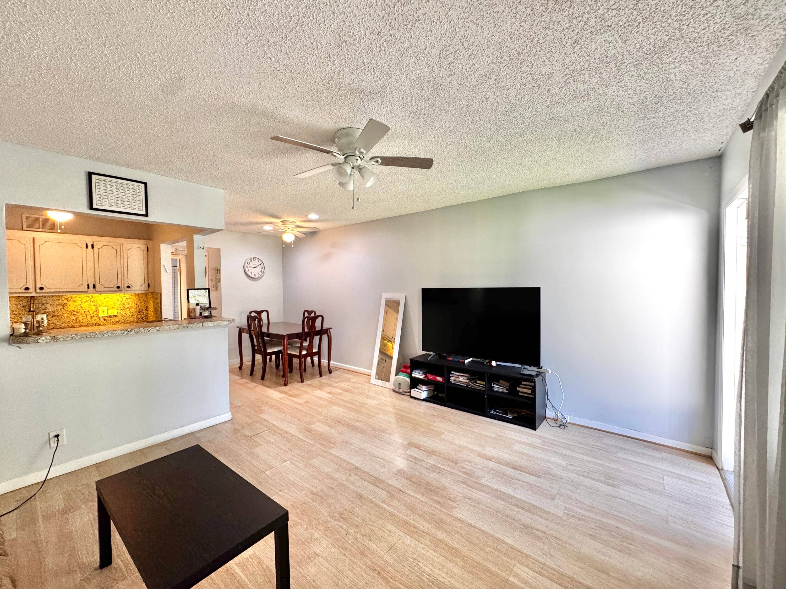 Discover Your Dream Oasis at Century Village Deerfield Beach's 55 Crown Jewel !