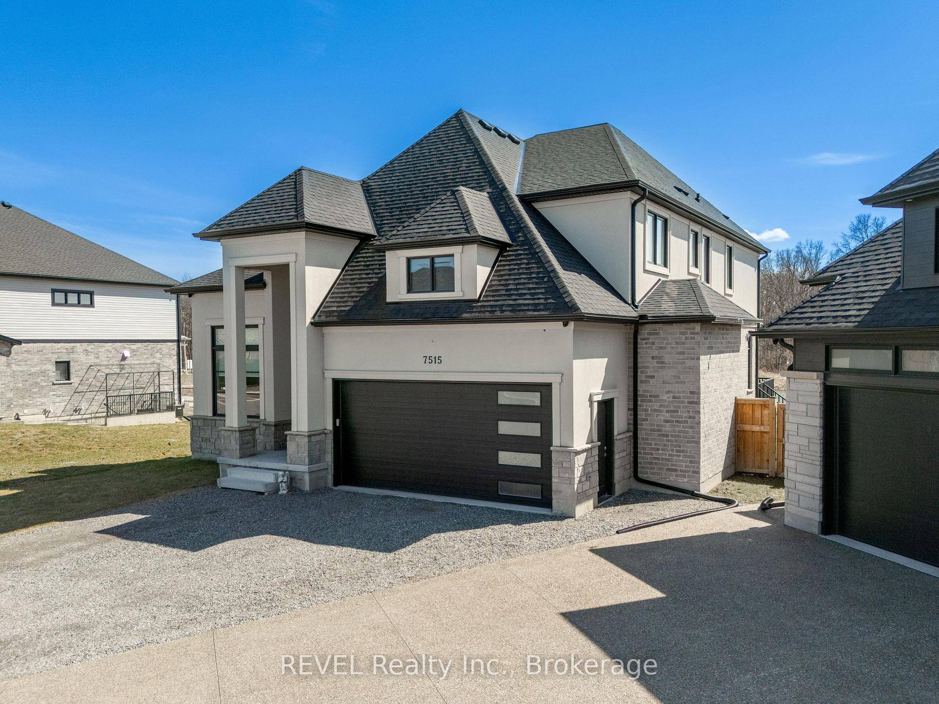 Luxury, style, and modern convenience define this stunning 2 storey stone amp ; stucco home, built in 2022 and backing onto a tranquil retention pond.