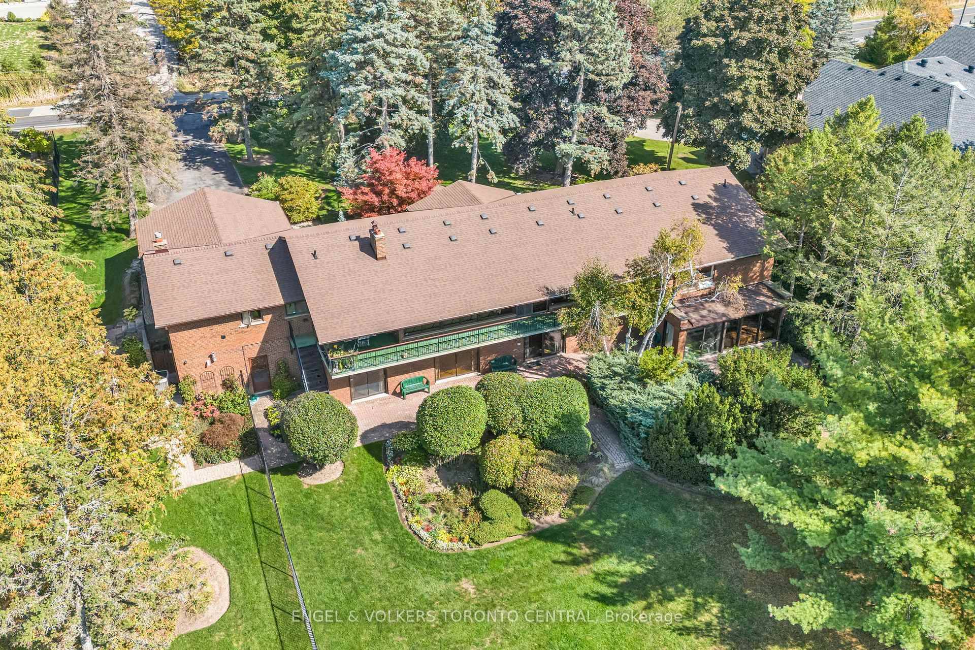 56 Cachet Parkway is a truly exceptional property and a rare opportunity to own prime real estate with boundless potential on a magnificent 1.