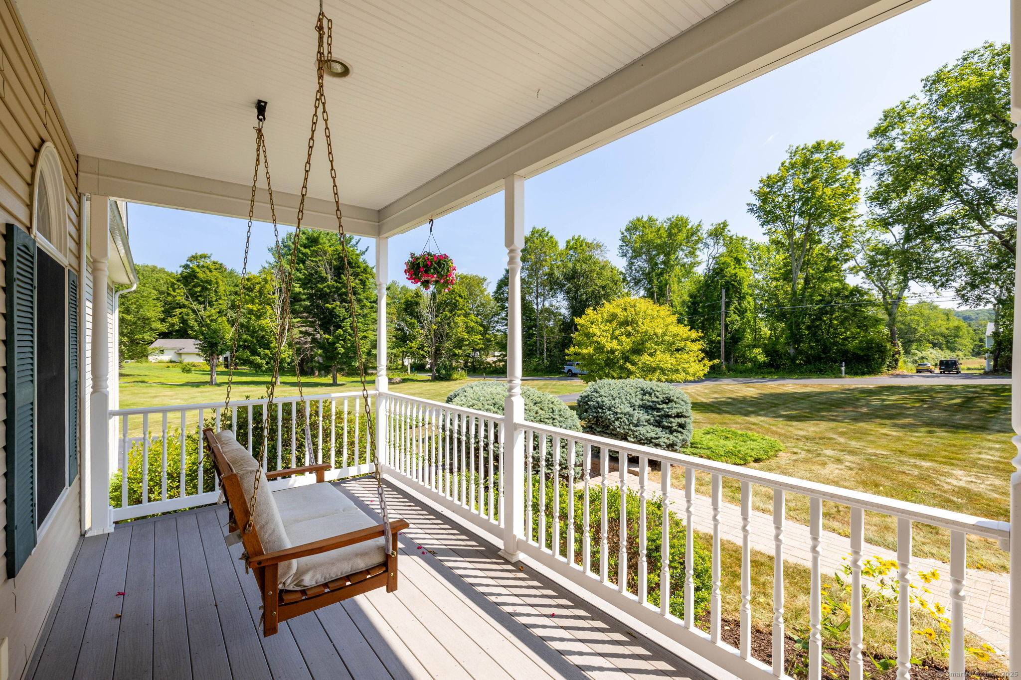 Nestled on 1. 84 acres of beautifully landscaped grounds, this meticulously maintained colonial home offers a serene retreat on a quiet country road.