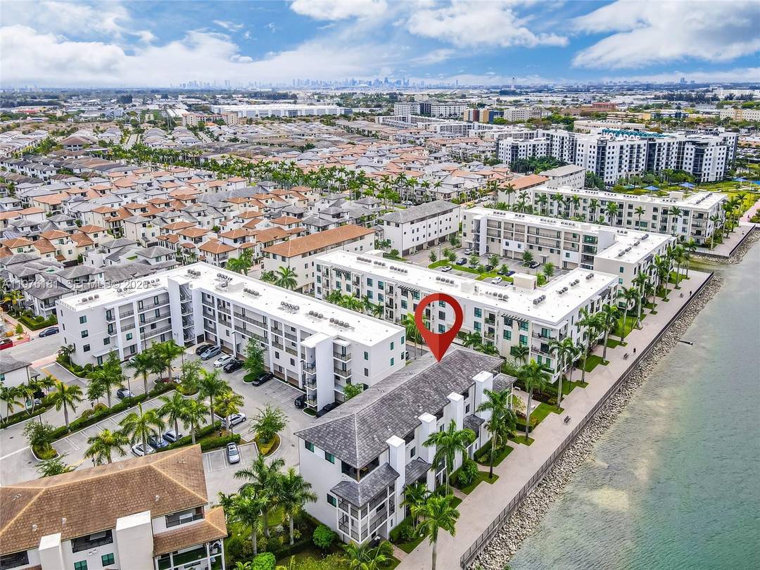 Stunning fully renovated lakefront townhouse located in the highly desirable Downtown Doral community.