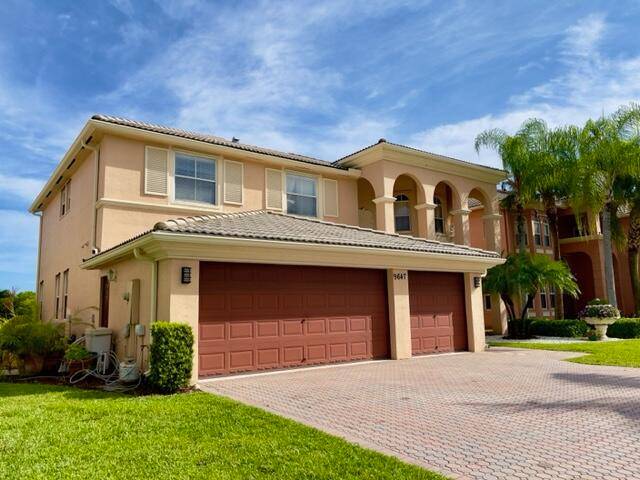 WELCOME TO THIS SPACIOUS 5 BEDROOM AND 3 BATHROOM ESTATE HOME LOCATED IN WELLINGTON'S FINEST COMMUNITY OF OLYMPIA.