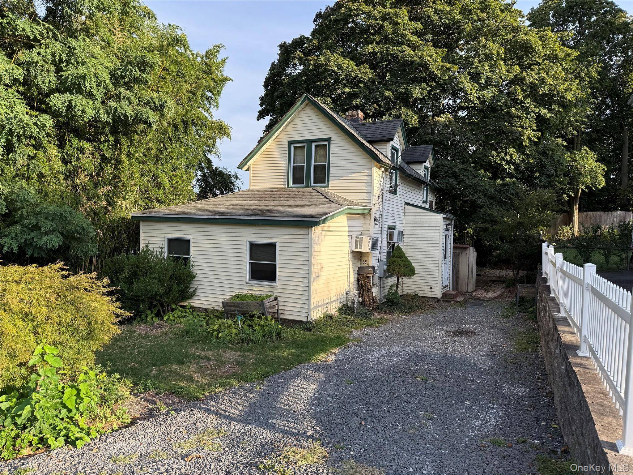 Discover an exceptional opportunity to own a classic village home in a prime location.