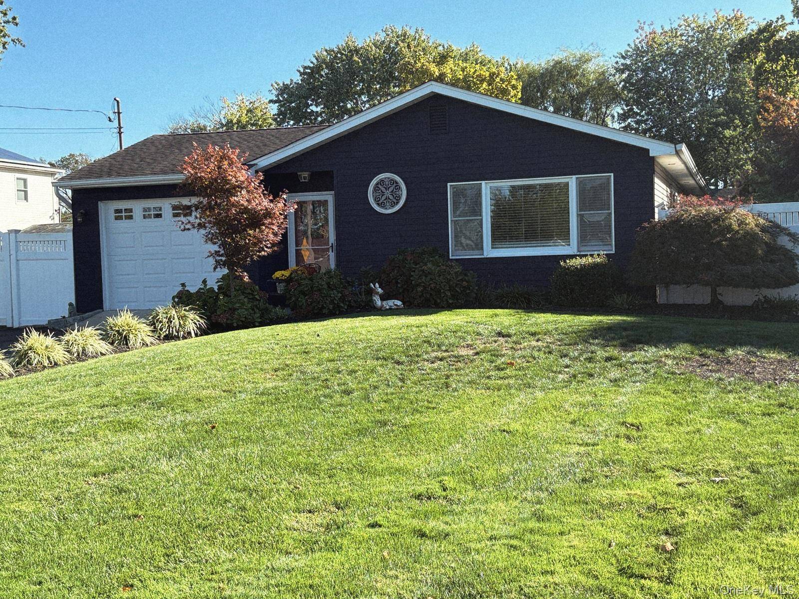 Welcome to this beautifully updated 3 bedroom, 2 full bath ranch, ideally located in the charming Village of Patchogue.