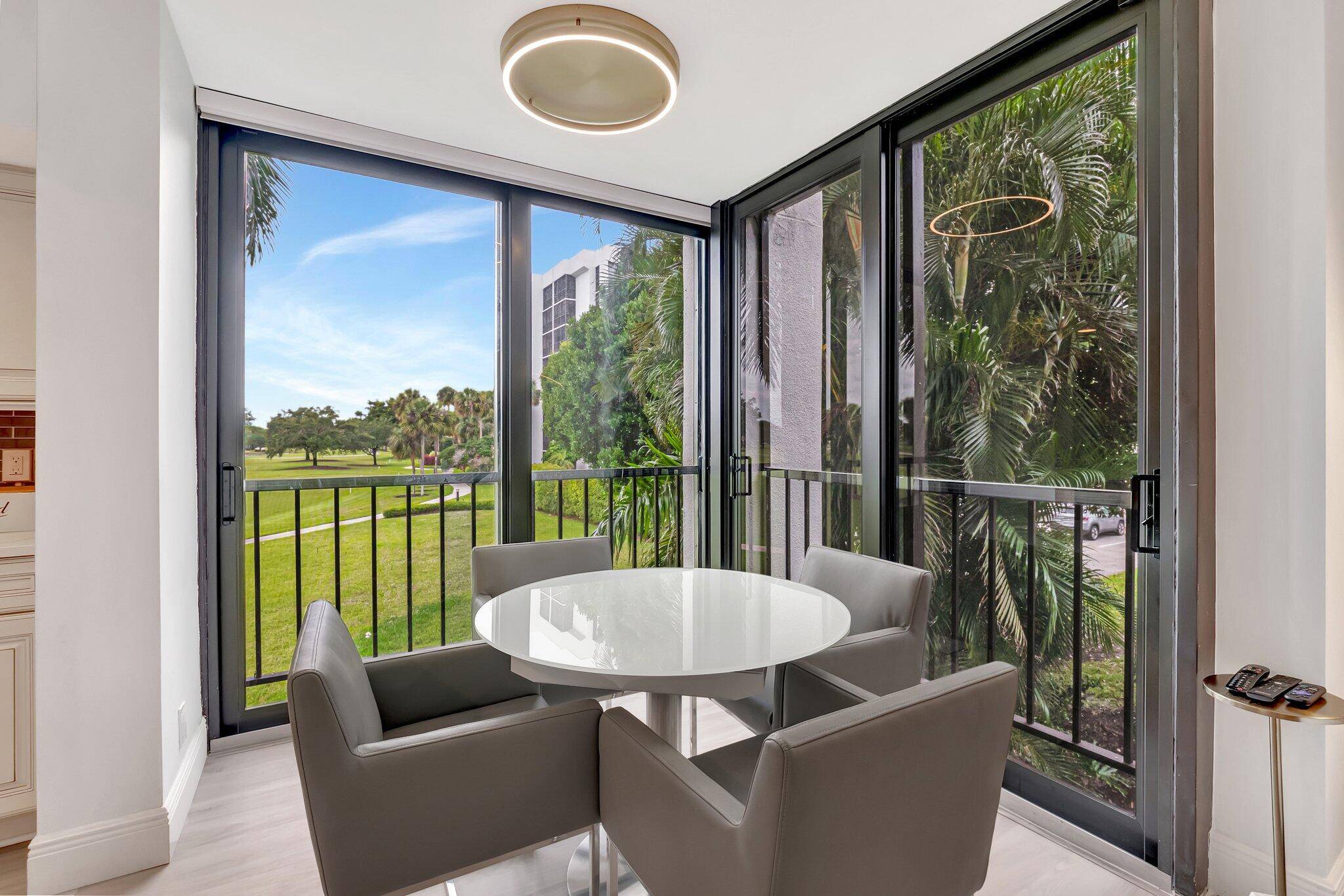 Beautifully renovated corner unit is move in ready and perfectly designed for resort style living.
