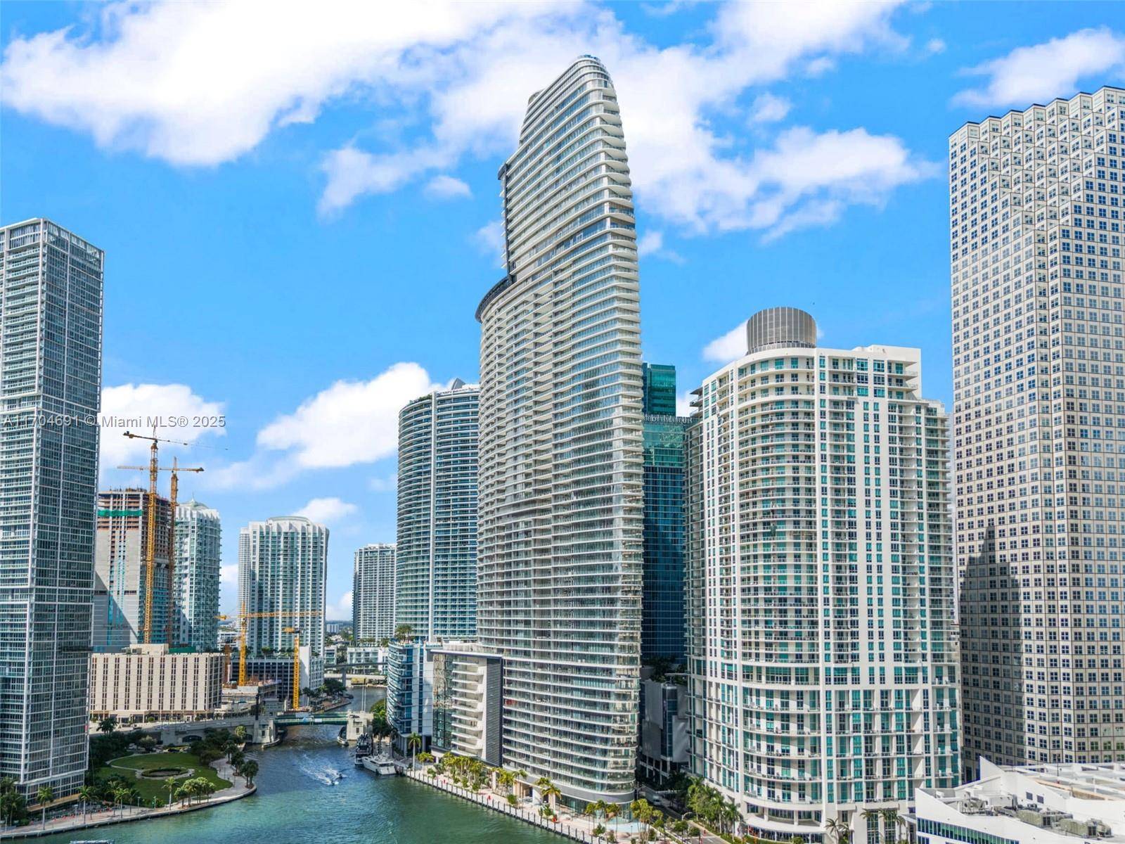 Welcome to an exceptional retreat on the 35th floor of the renowned Aston Martin Residences.
