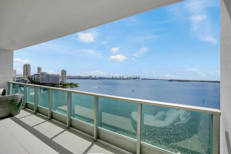 Step out of the elevator into your private foyer and enter this custom designed, East to West flow 3 bedroom, 3 bath 2, 130 sq ft residence w panoramic, unobstructed ...