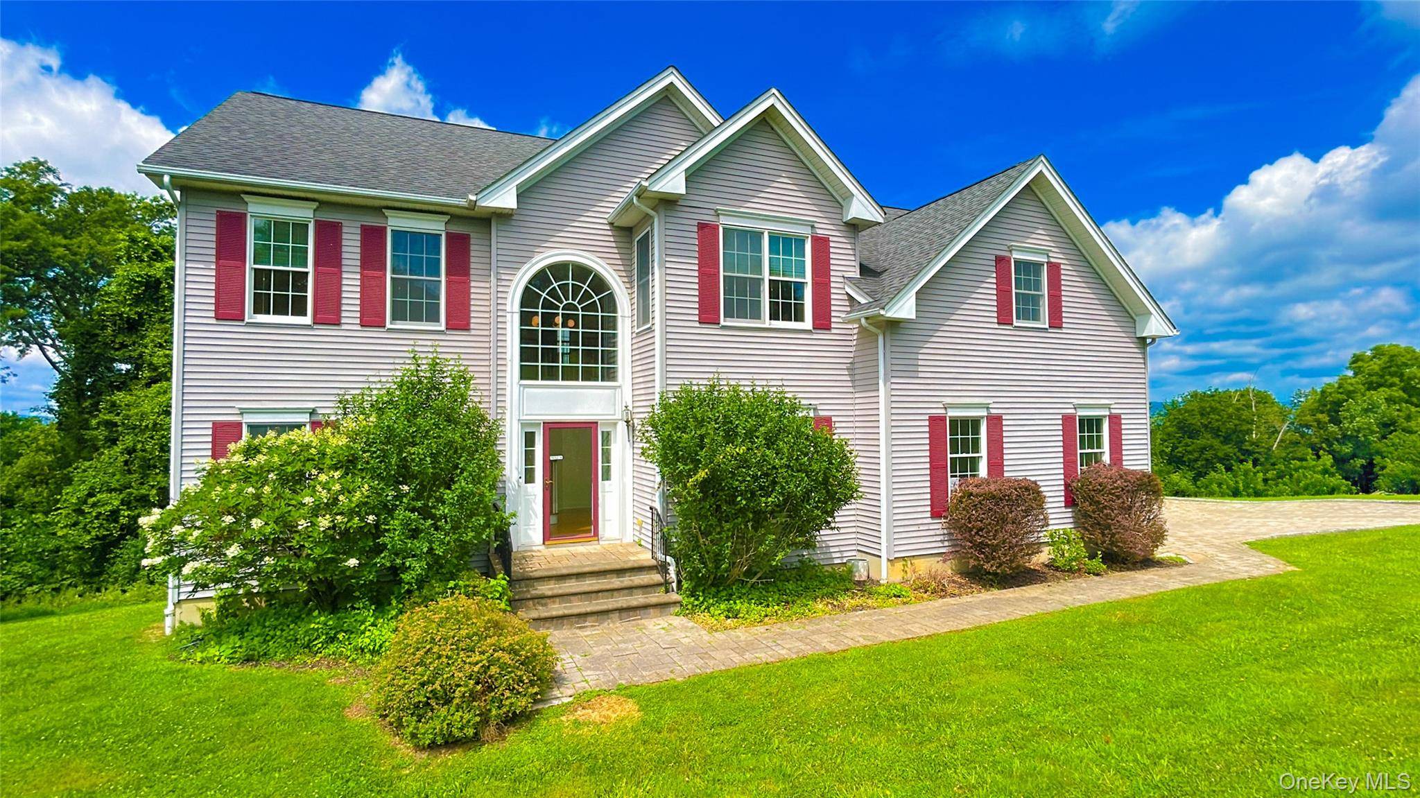 This spacious four bedroom colonial in Wappingers Falls is a must see !