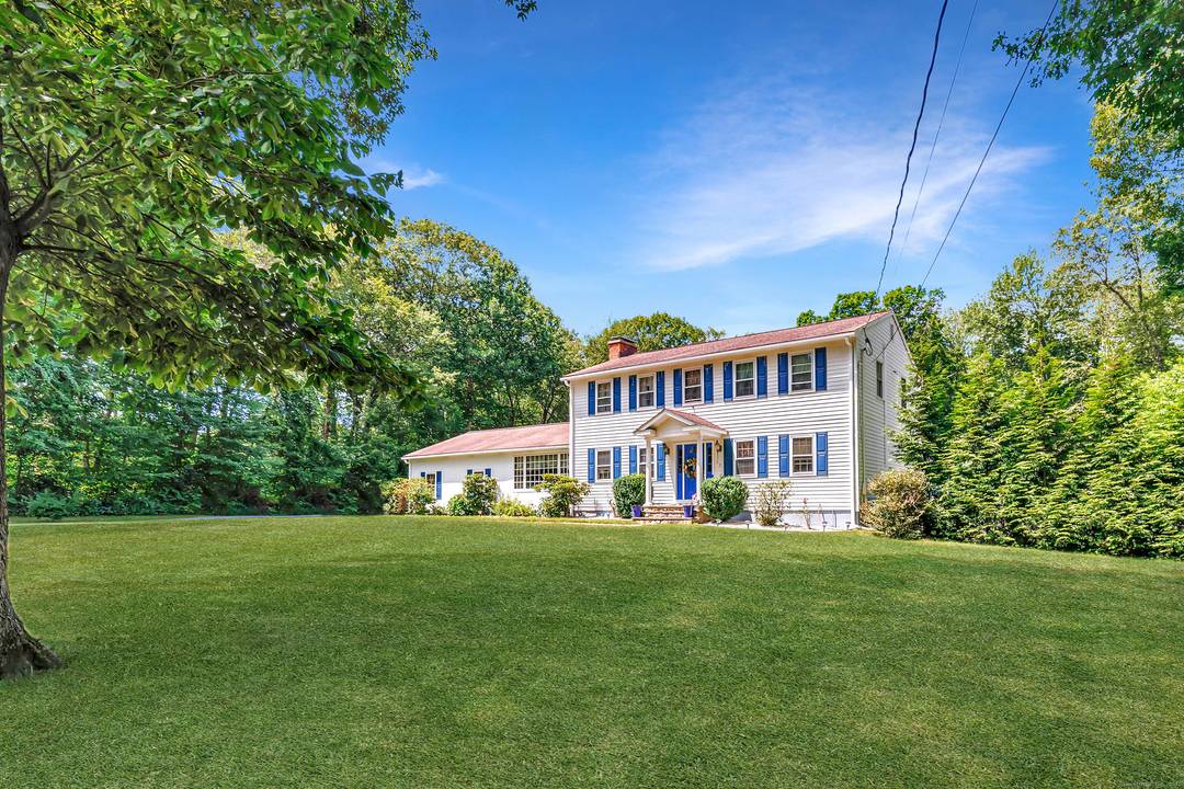Welcome to 23 Bonita Drive a beautifully maintained 8 room Colonial tucked away on a private wooded 1.