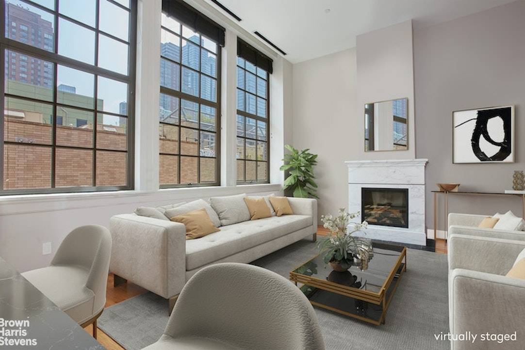 This top floor 2 bedroom 2 bath condominium unit provides a loft like feel with a spacious layout.