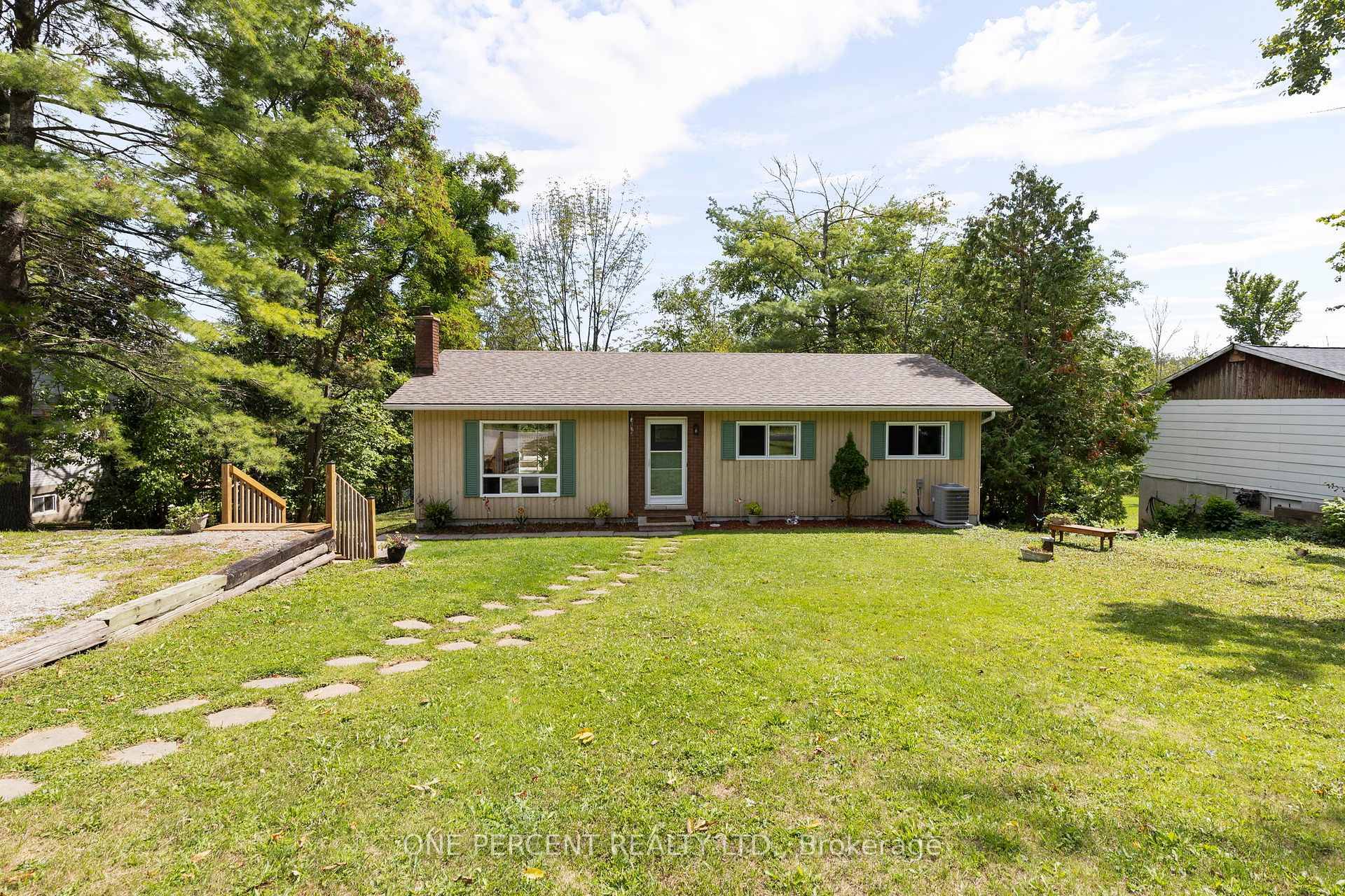 Welcome to 4297 Huronia Road ideally situated at the border of Severn and North Orillia, this home offers a peaceful retreat surrounded by nature yet close to all amenities.