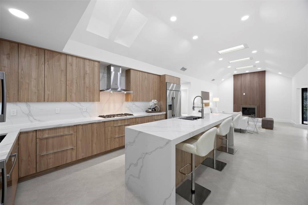 Experience refined living in this fully reimagined 5 bed 4 bath estate w office amp ; florida room set within the gated community of Estancia West.