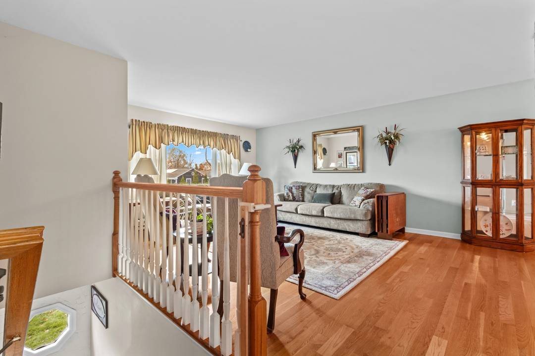 Attractive and updated 3 BR 2 Bath Raised Ranch with lots of natural light and spacious open floor plan for easy living and entertaining.