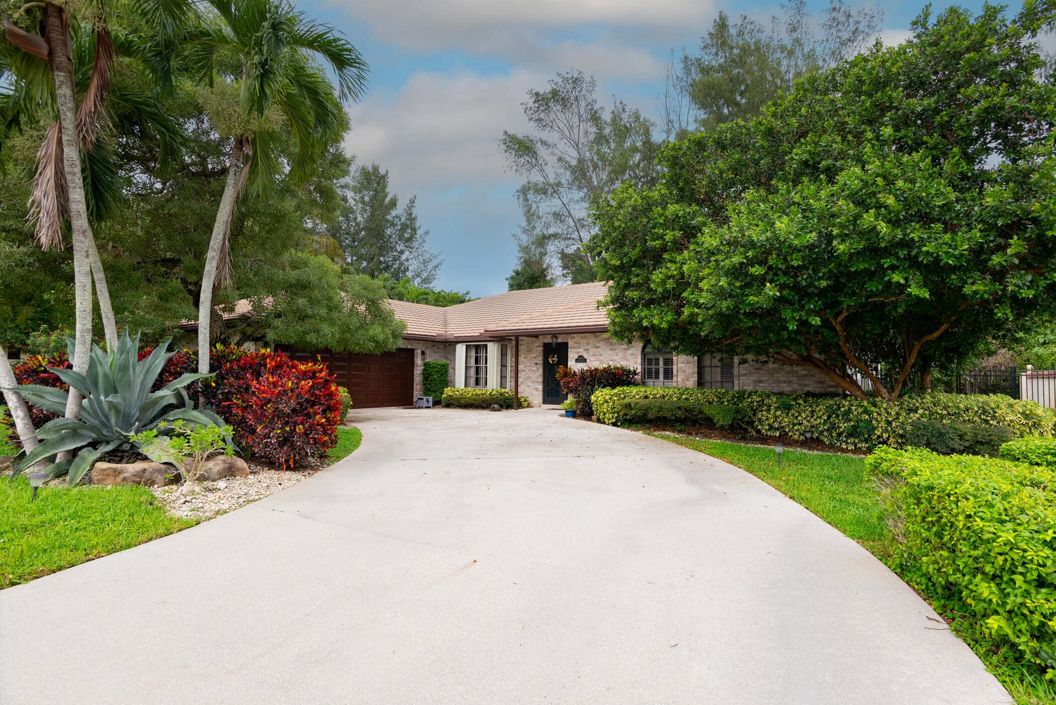 Beautifully updated rarely available 4 bedroom 2 1 2 bath house with beautiful screened in heated pool located on a large private lot in prestigious neighborhood with NO HOA.