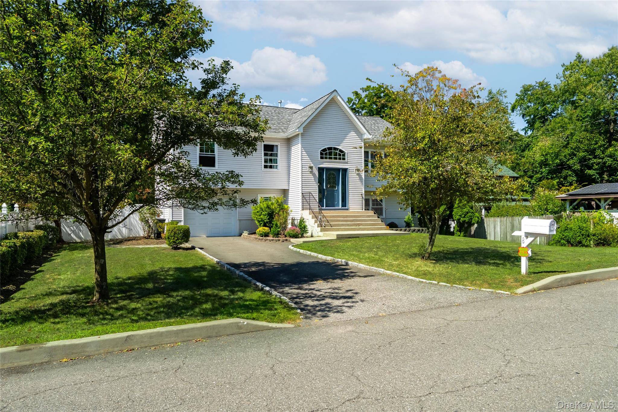 Welcome to this well maintained 19 year old bi level home, perfectly set on a 1 3 acre lot.