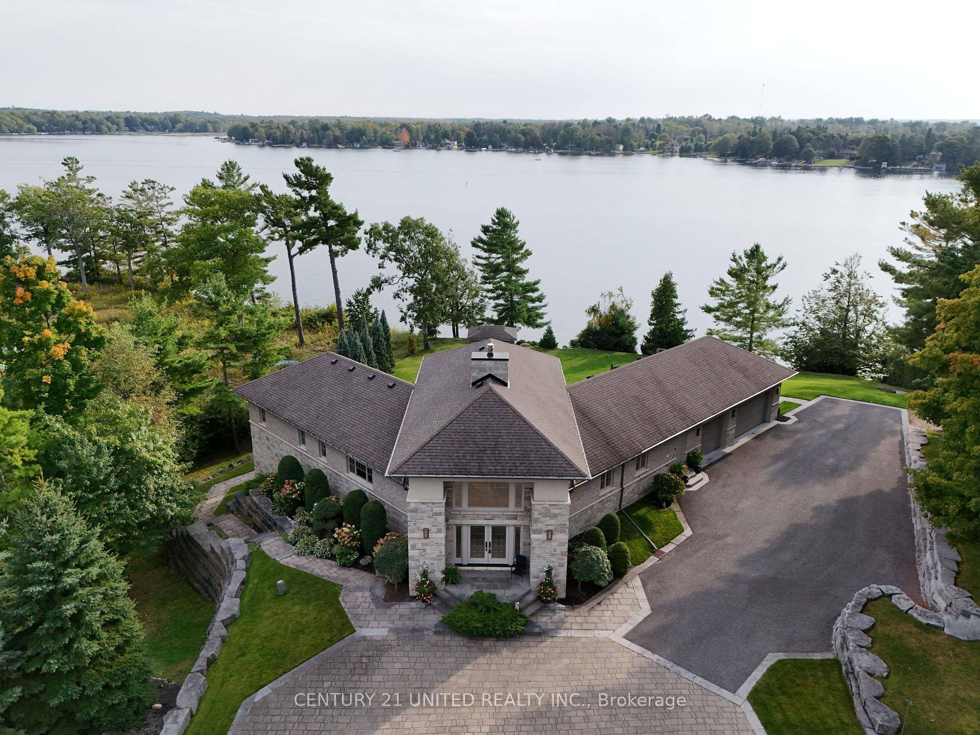 Welcome to Oak Orchard Estates, a prestigious, gated community offering luxury living on the shores of Upper Buckhorn Lake.