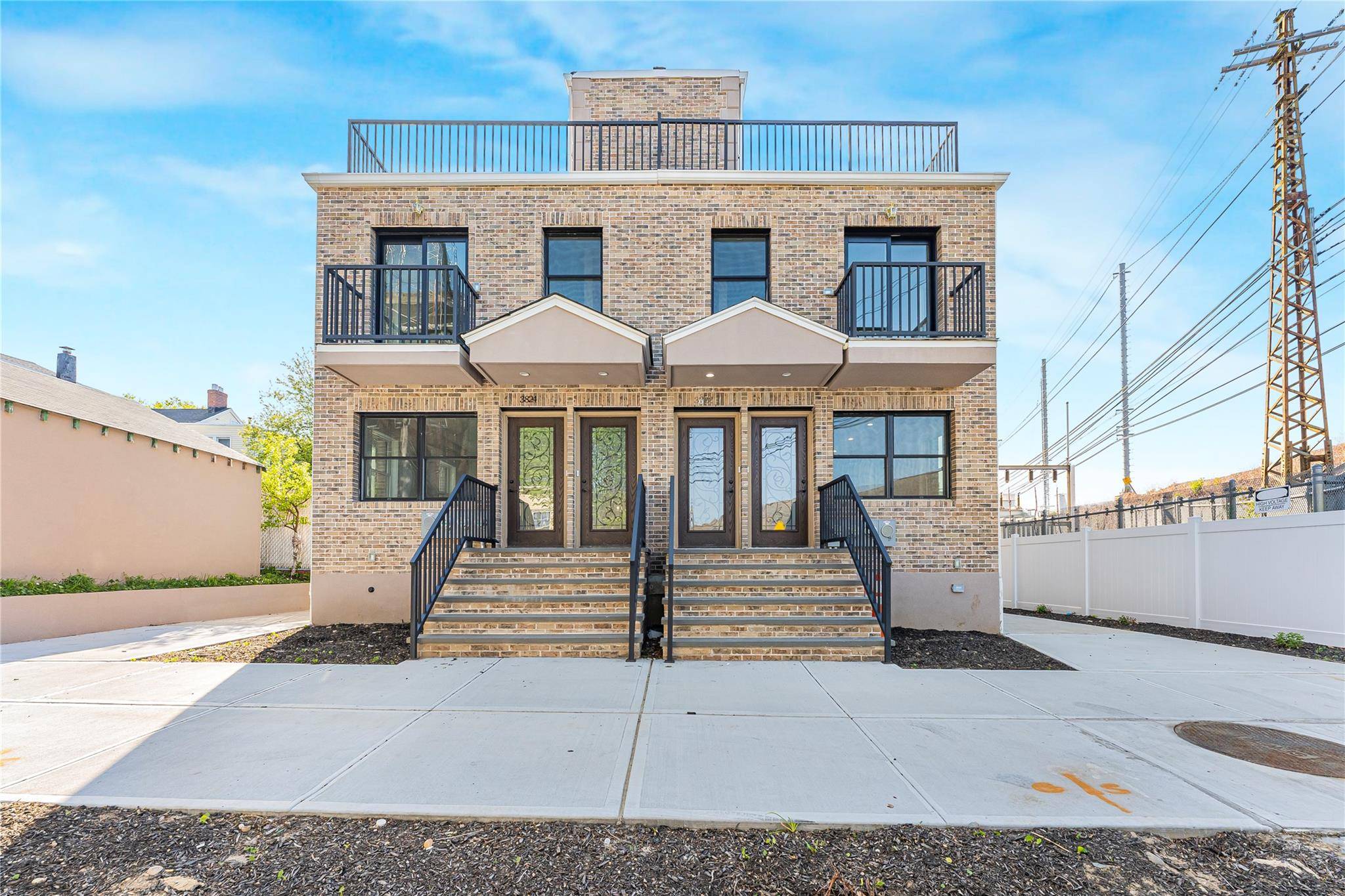 New Construction Two Family Home in Prime Woodside !