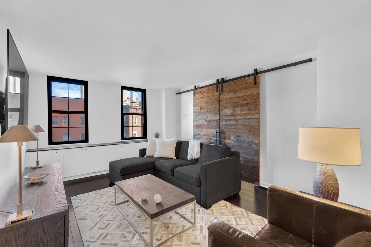 Stunning West Village Condo w Empire State Building Views Experience an exciting Downtown lifestyle at the nexus of the West Village, the Meatpacking District, and Chelsea in this quiet 1 ...