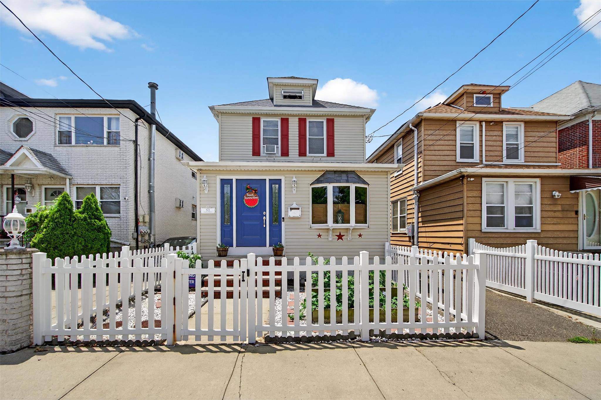 Large fully detached 2 bedroom home in Throggs Neck with a finished basement, large yard, full attic, garage, hardwood floors, lots of natural sunlight and close to highways and buses.