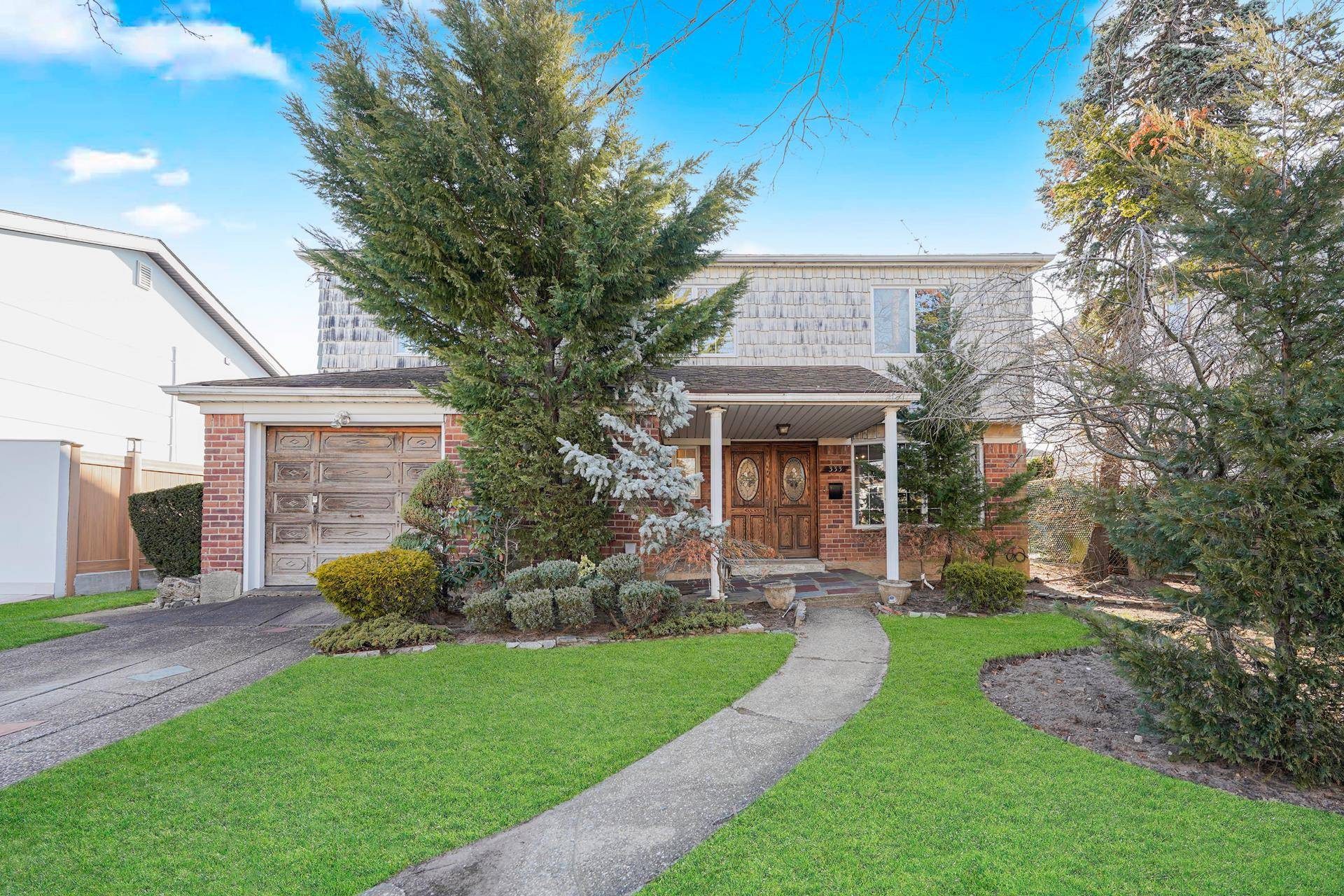 Welcome to this imperial split level home, perfectly situated on a 51x100 lot in the heart of sort after Mill Basin on a tree lined block.