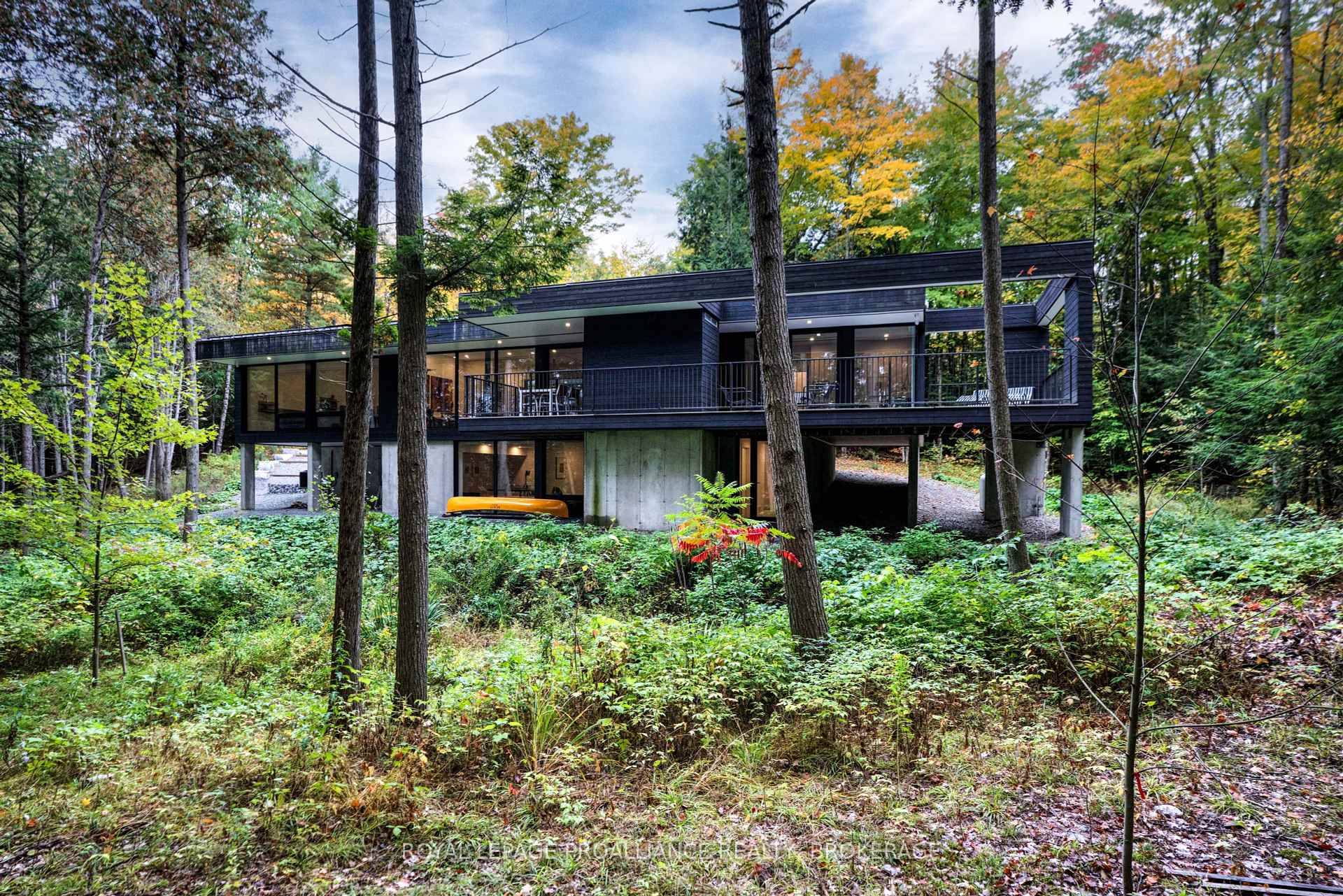 Stunning year round home in a private and densely wooded setting located on Kennebec Lake.