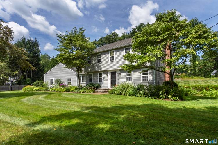 Welcome to 50 Fox Den Road a warm, inviting home in a sought after neighborhood, offering over 3, 400 square feet of comfortable, flexible living space.