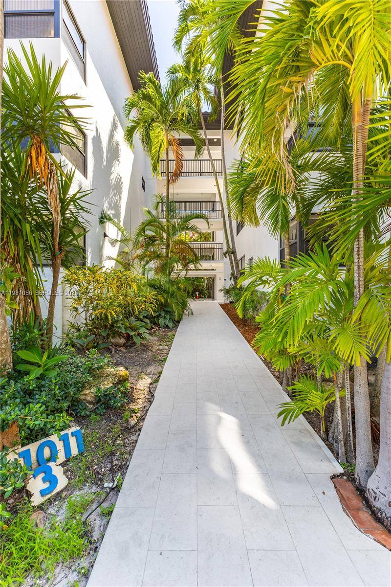 RARE ON THE MARKET ! ! Discover this spacious and bright 2 2 one of a kind lanai at Ocean Village, Key Biscayne.