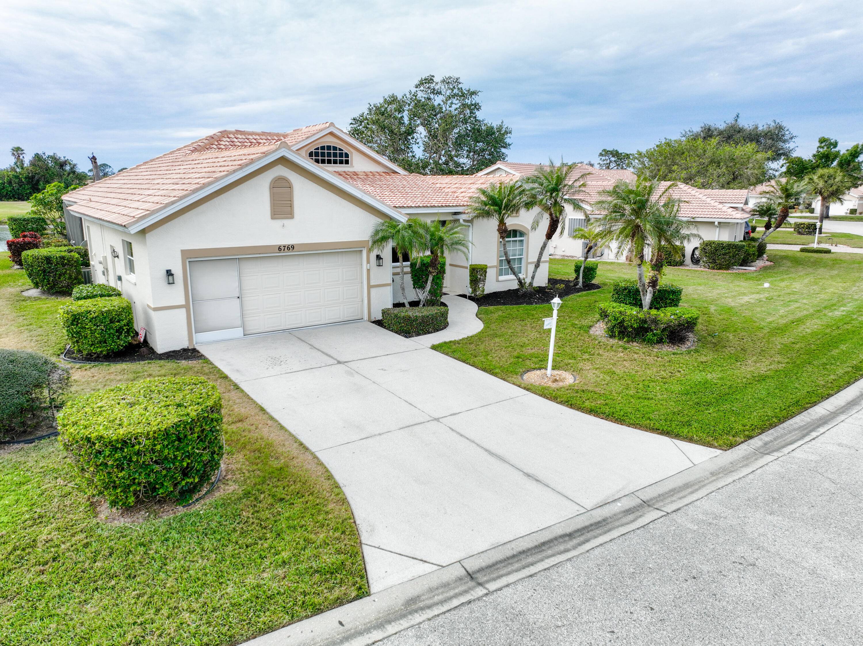 6769 Greenview offers a spacious open floor plan, featuring high ceilings, Italian tile floors, bright and airy dining and living areas, which lead you to a view of the Lanai, ...