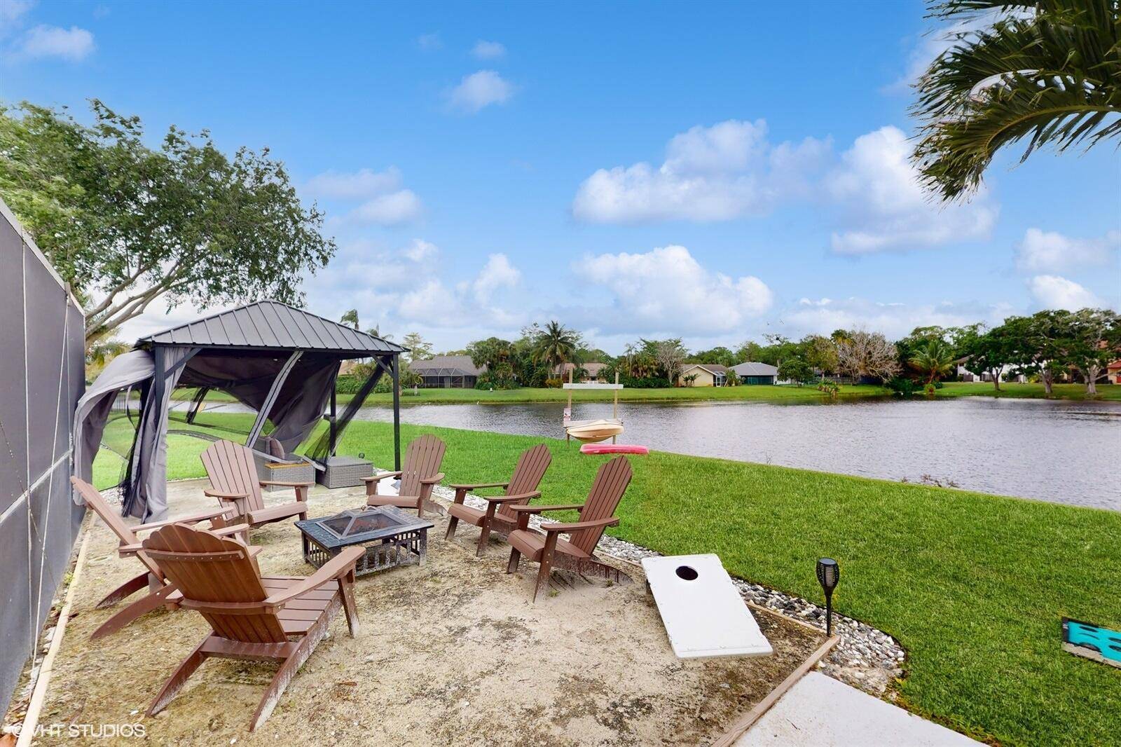 Discover the allure of this stunning 5 bedroom, 3 bathroom home in the sought after Sugar Pond Manor, boasting the picturesque water view you've been longing for !