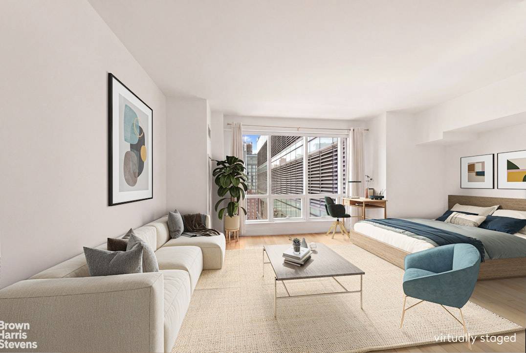 Highest floor 28th Floor alcove studio available at 'The Orion'.