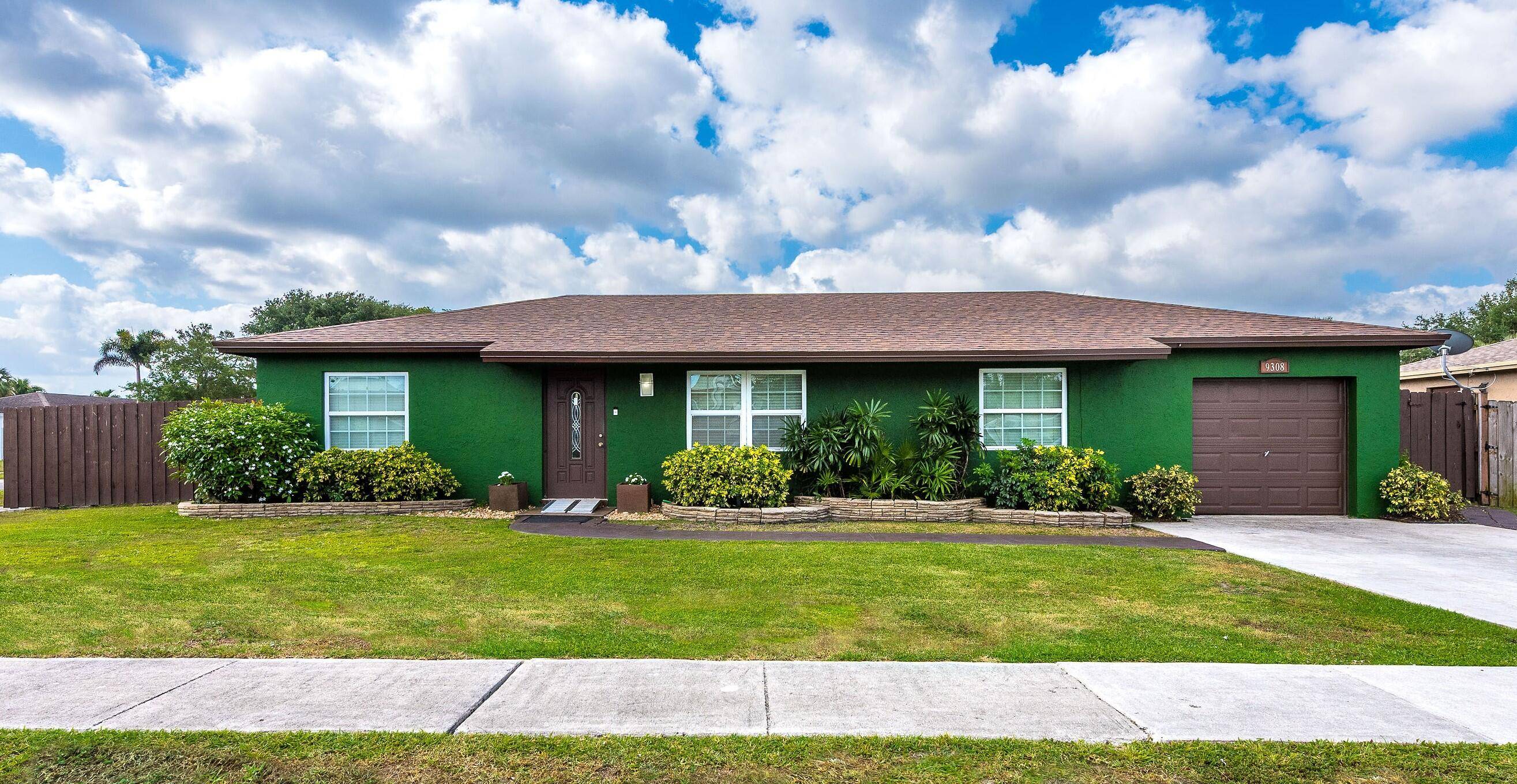 Spacious and stylishly updated home featuring an open floor plan and an extended kitchen with stainless steel appliances, perfect for entertaining and everyday living.