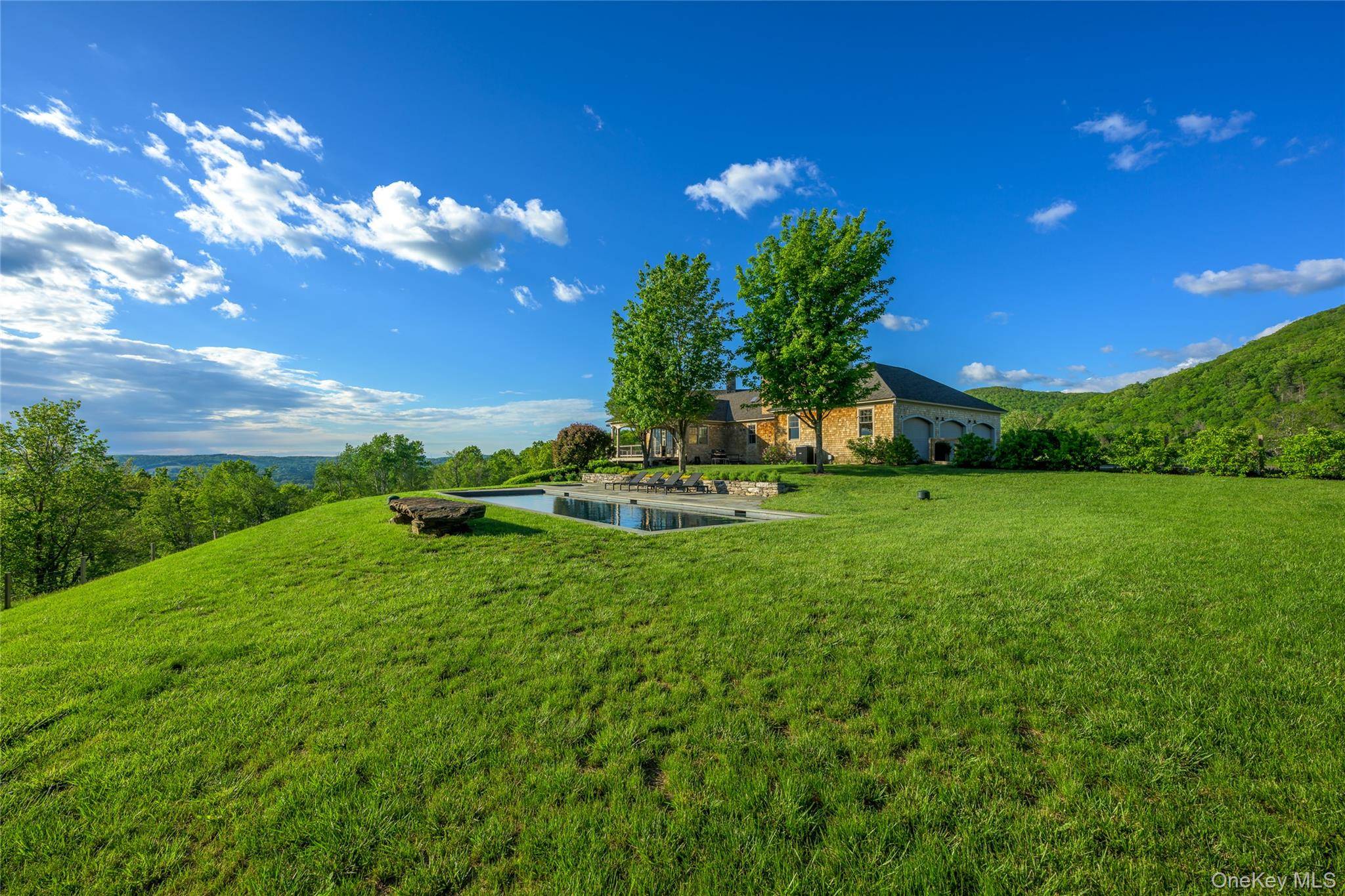 Exceptional Hudson Valley Estate where peaceful modern living meets mountain majesty.