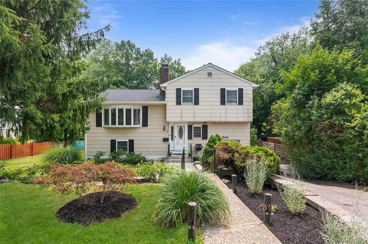 Nestled on a quiet street in the Pennybridge neighborhood of Tarrytown and located within the Irvington School District, this inviting home offers comfort, space, and convenience.