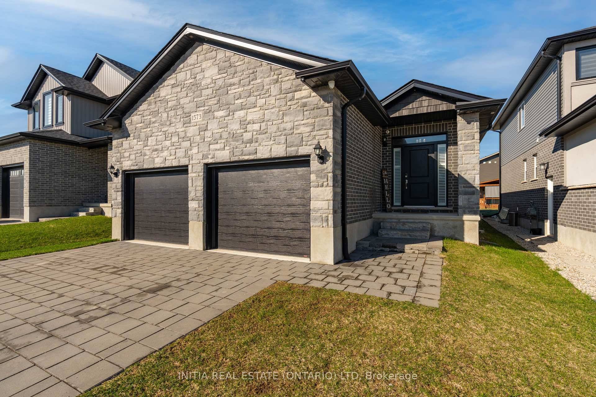 Welcome to this stunning custom built bungalow home, offering over 2, 100 sq ft of finished area and perfectly blending modern elegance with comfort.