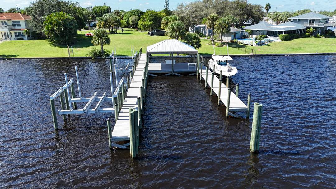 Welcome to 4345 SE Mulford Lane a rare opportunity to own one of the most desirable waterfront parcels in Stuart, Florida.